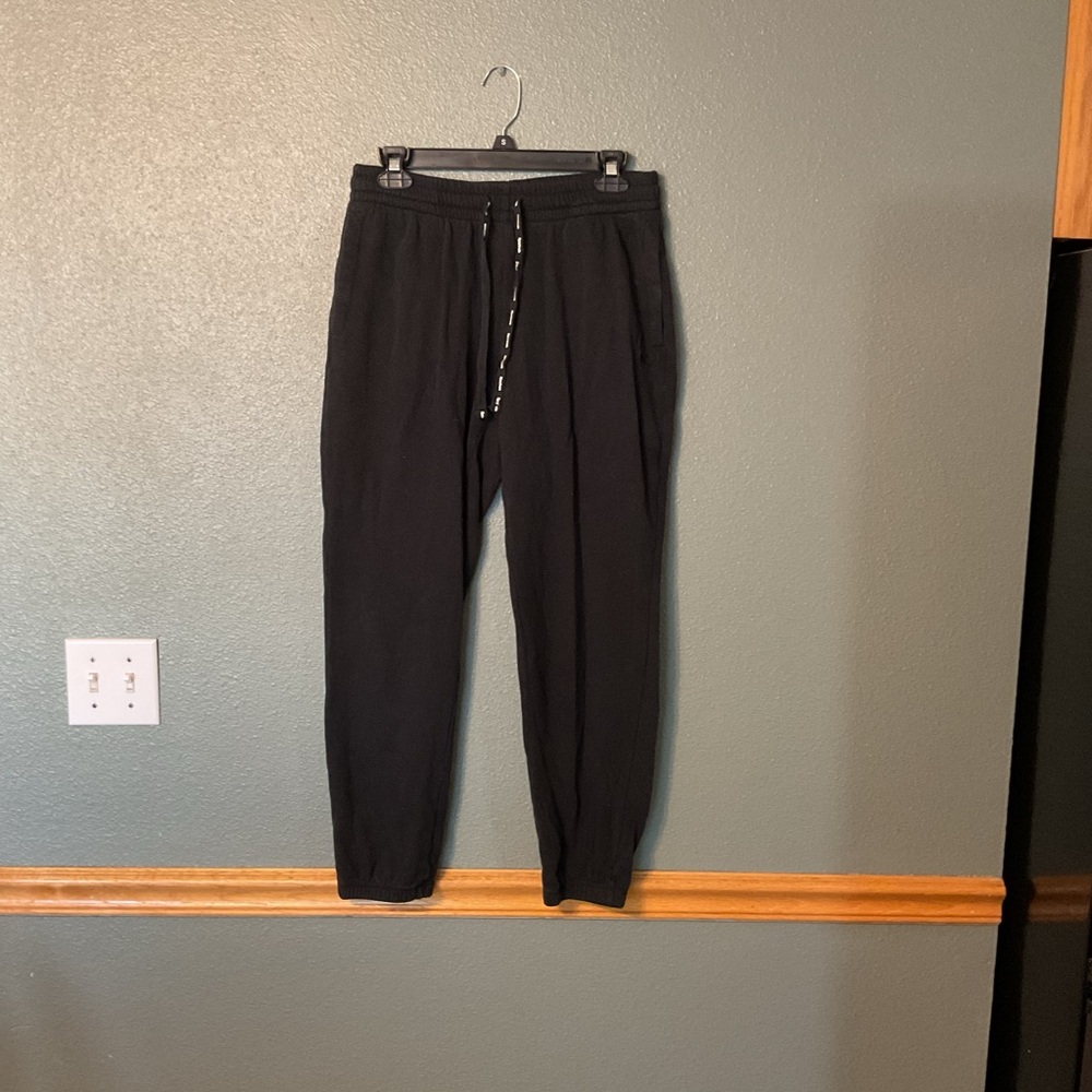 Reebok Black Track Pants with Elastic Cuffs and Tapered Fit